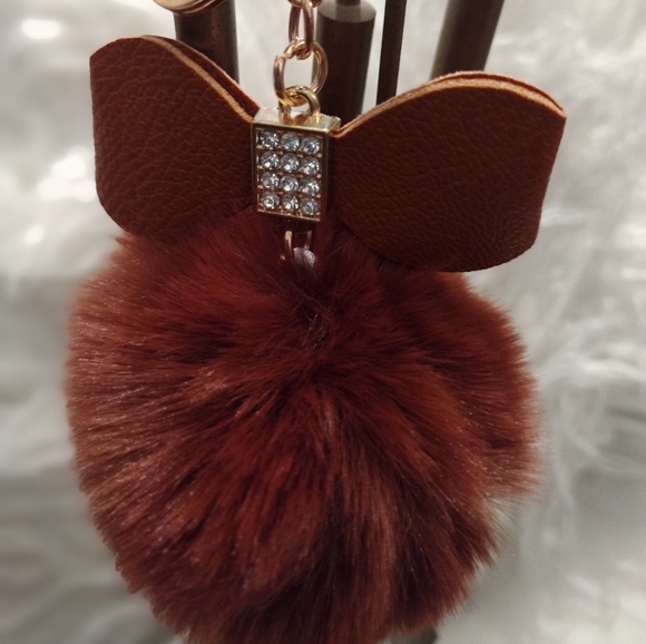 NWOT FAUX FUR BALL - Picture 1 of 3